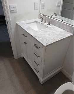 Custom Vanity Installation  A clean, professional vanity installation designed to give this bathroom a fresh, updated look. Carefully installed with attention to detail, alignment, functionality, and a polished finished appearance. Another quality home improvement project completed by Triple Leaf LLC.