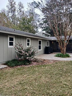 Painting this beautiful home after new siding was installed