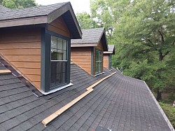 Put a fresh paint on the dormers after new siding was installed